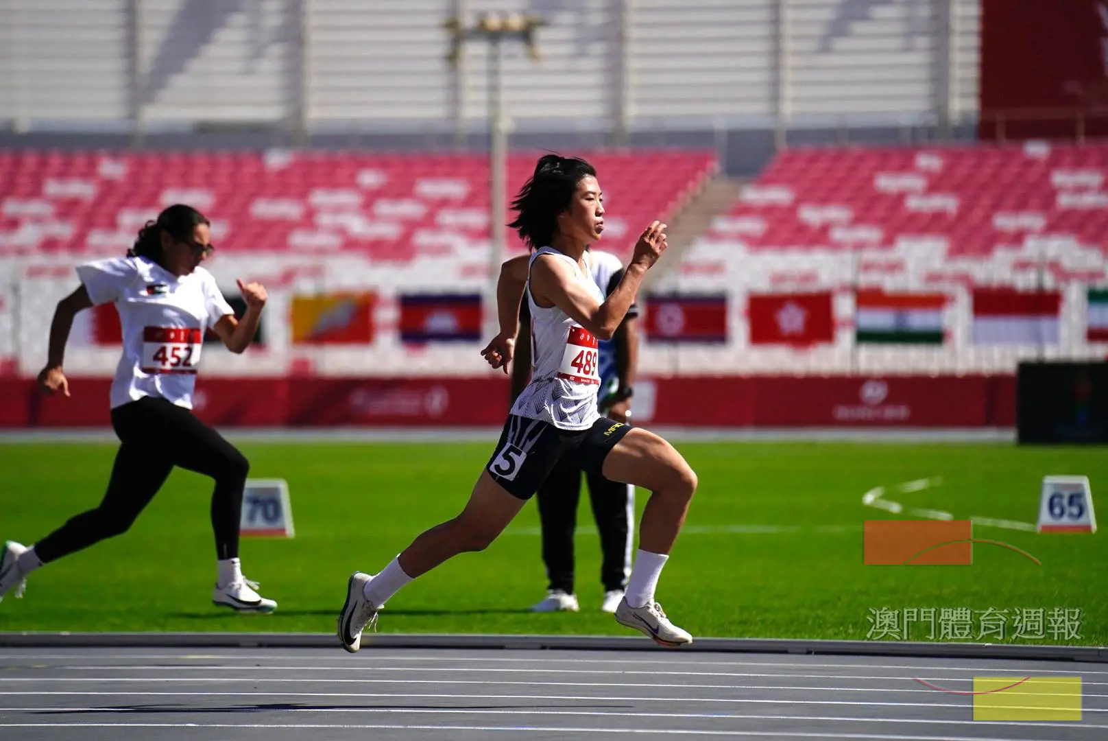 A2 陸嘉堯(前)女子100米賽事中.jpeg